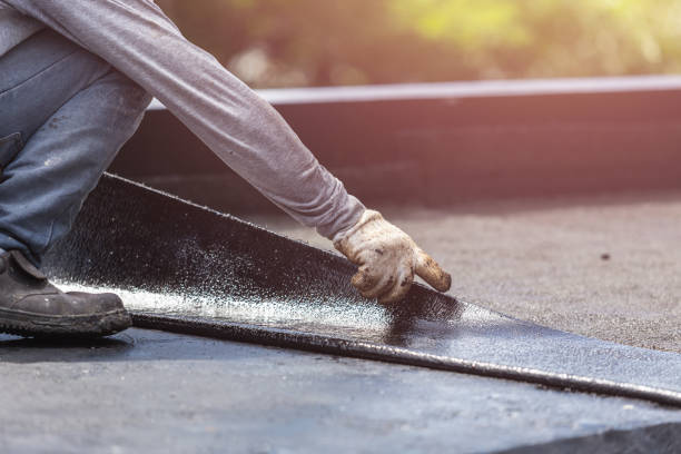 Professional Emergency Waterproofing technician working in Brightwaters, NY
